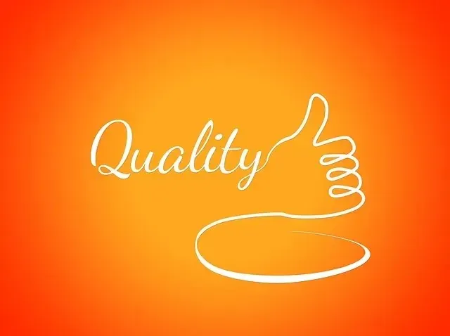 Quality word with thumbs-up outline on orange background