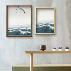 Framed wave artwork above table