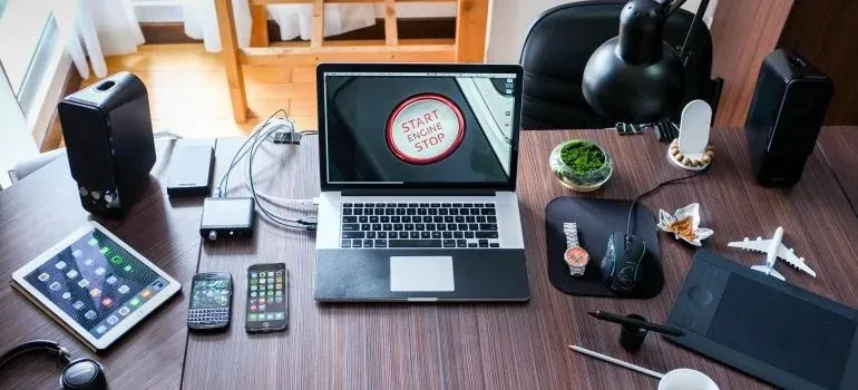 Desk with laptop and gadgets