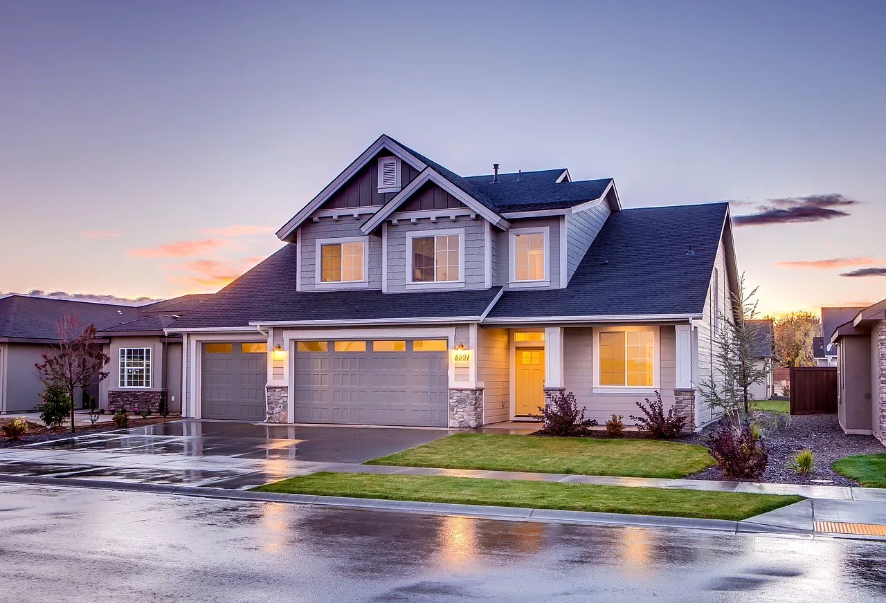 Suburban house at dusk after rain
