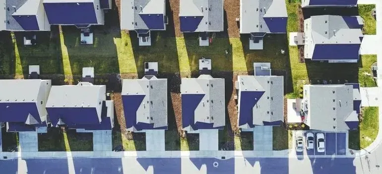 Aerial view of suburban neighborhood houses and street