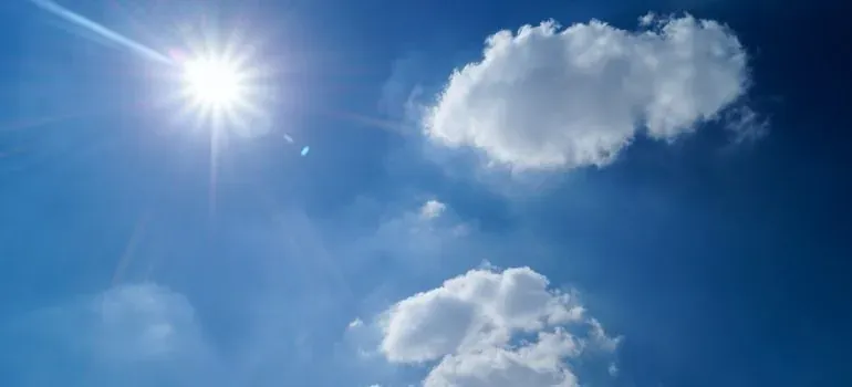 Sunny blue sky with clouds