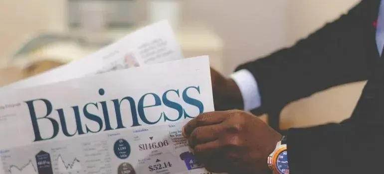 Businessman reading Business section of a newspaper