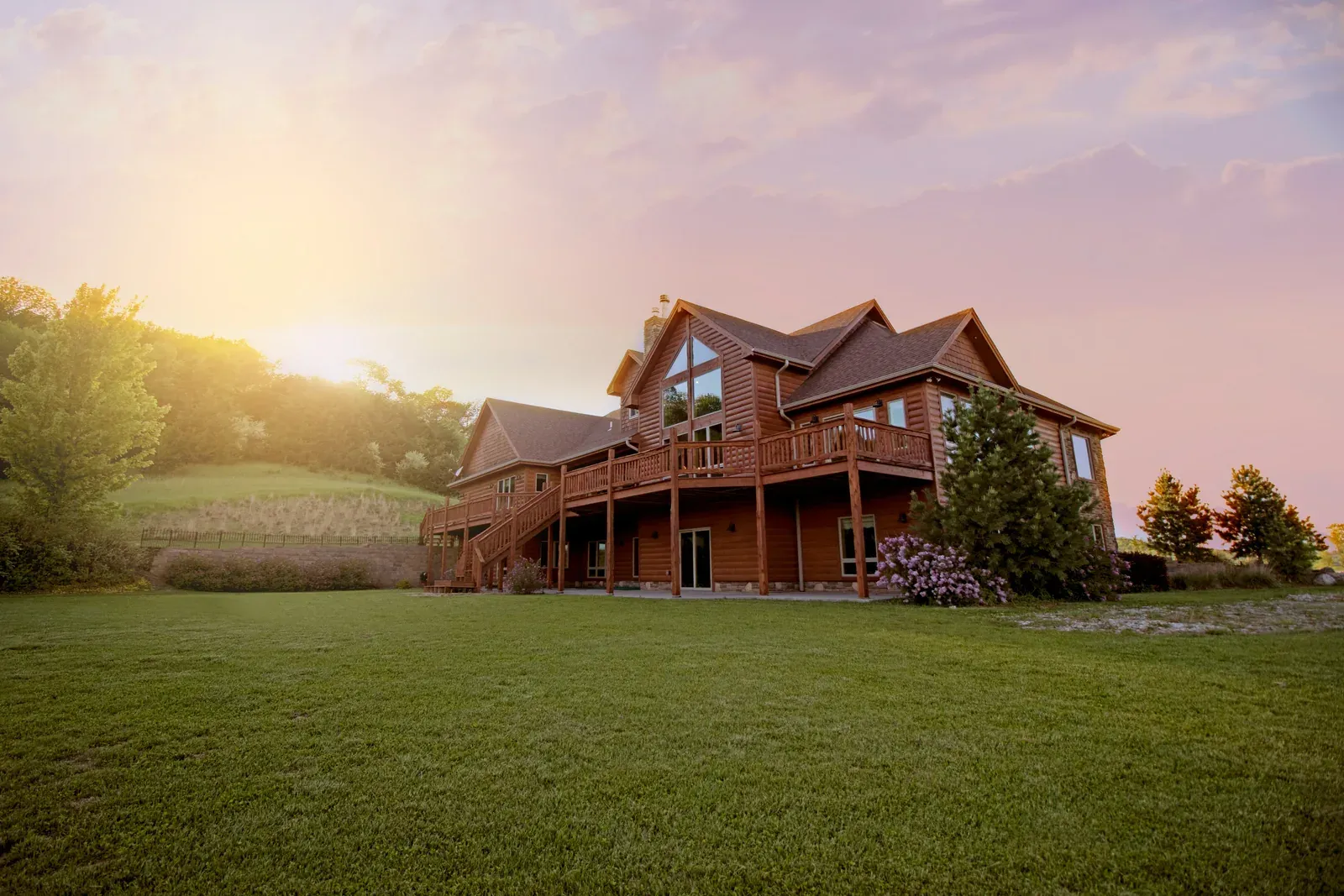 Large wooden house at sunset