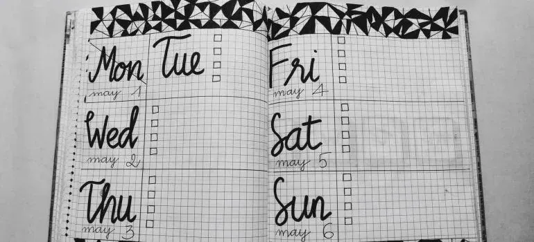 Hand-drawn weekly planner notebook