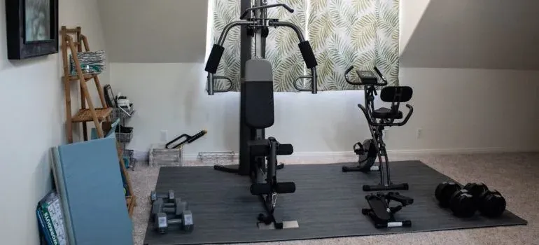 Home gym equipment in attic room