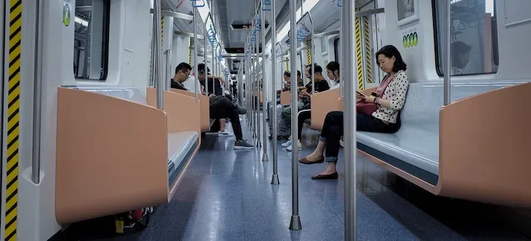 Passengers inside subway train car