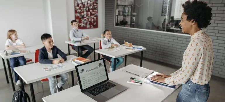 Teacher and kids in classroom