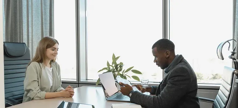 Office interview across a desk