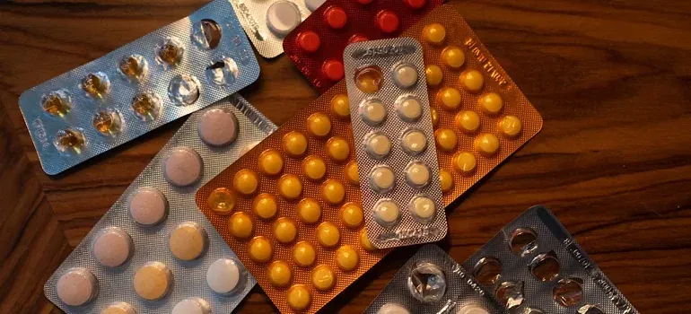 Pill blister packs on wood