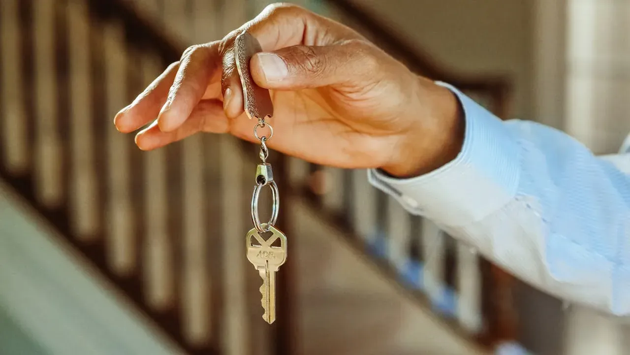 Person reviewing a short-term rental listing before a move in New Jersey