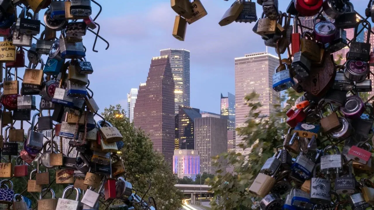 Love locks framing city skyline