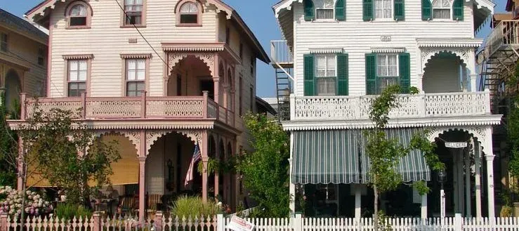 Victorian houses with porches, no readable branding