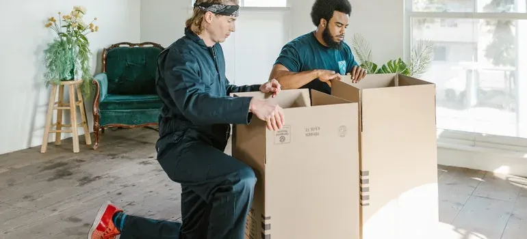 Professional movers carrying furniture in New Jersey