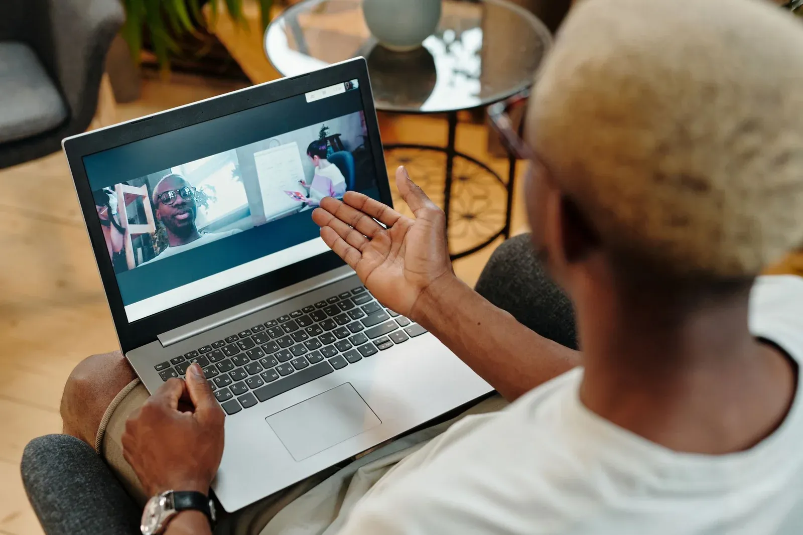 A homeowner showing rooms to a mover during a video call estimate