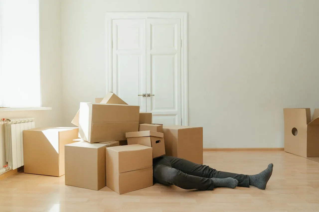 Professional packers wrapping and boxing belongings for a New Jersey move
